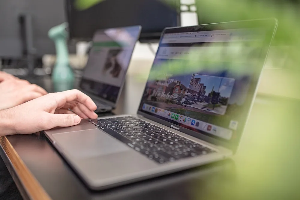 A business website designed and built by Halizona, shown on a laptop